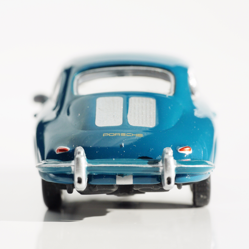 Illustration for article titled Kyosho Porsche 1 1/64 #84 - Projekt RennSport Käfer #2 - 1965 Porsche 356 C Coupe